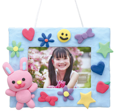 Wall-mounted photo frame with AT clay S01