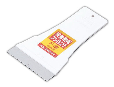 Cross-cut trowel for adhesive F-1 type01